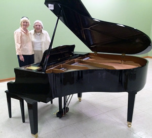 Meredith Jordan Braddy of Talbotton, Ga., left, and her mother, Grace Jordan, were on hand for the delivery of our new baby grand piano, donated by Meredith and her sister, Marjorie Jordan Spires of Alexandria, Va.